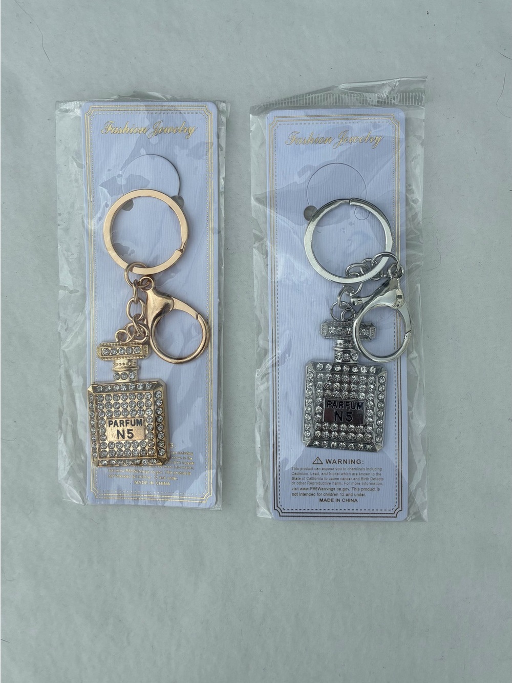 Rhinestone Parfum Bottle Keychain - Gold and Silver (Set of 2)